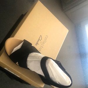Size 8- Beautiful black suede wedges from Clark’s . Never worn in the box.